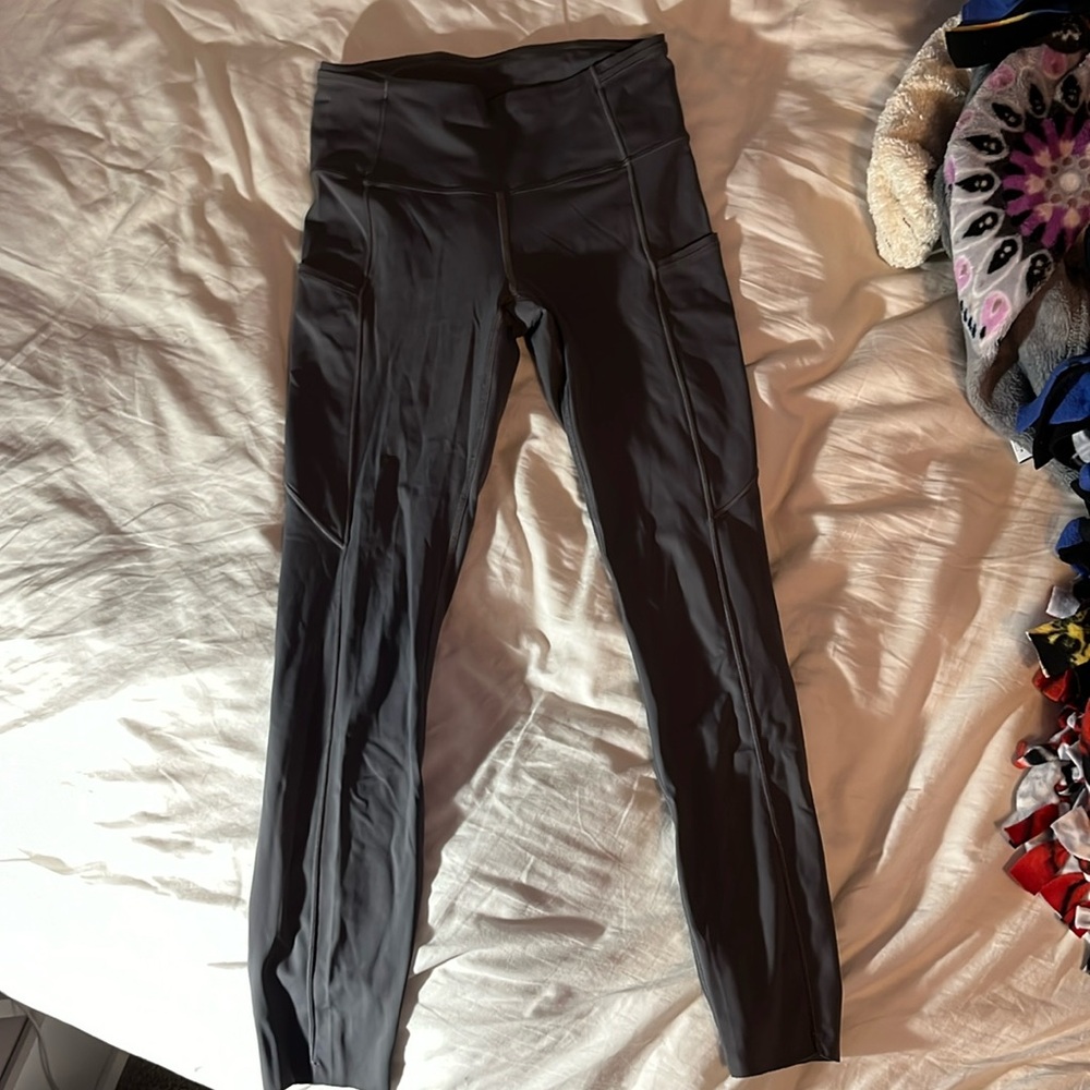 Dark gray Lululemon Fast and Free leggings. Size 4 or 6 (no tag indication).